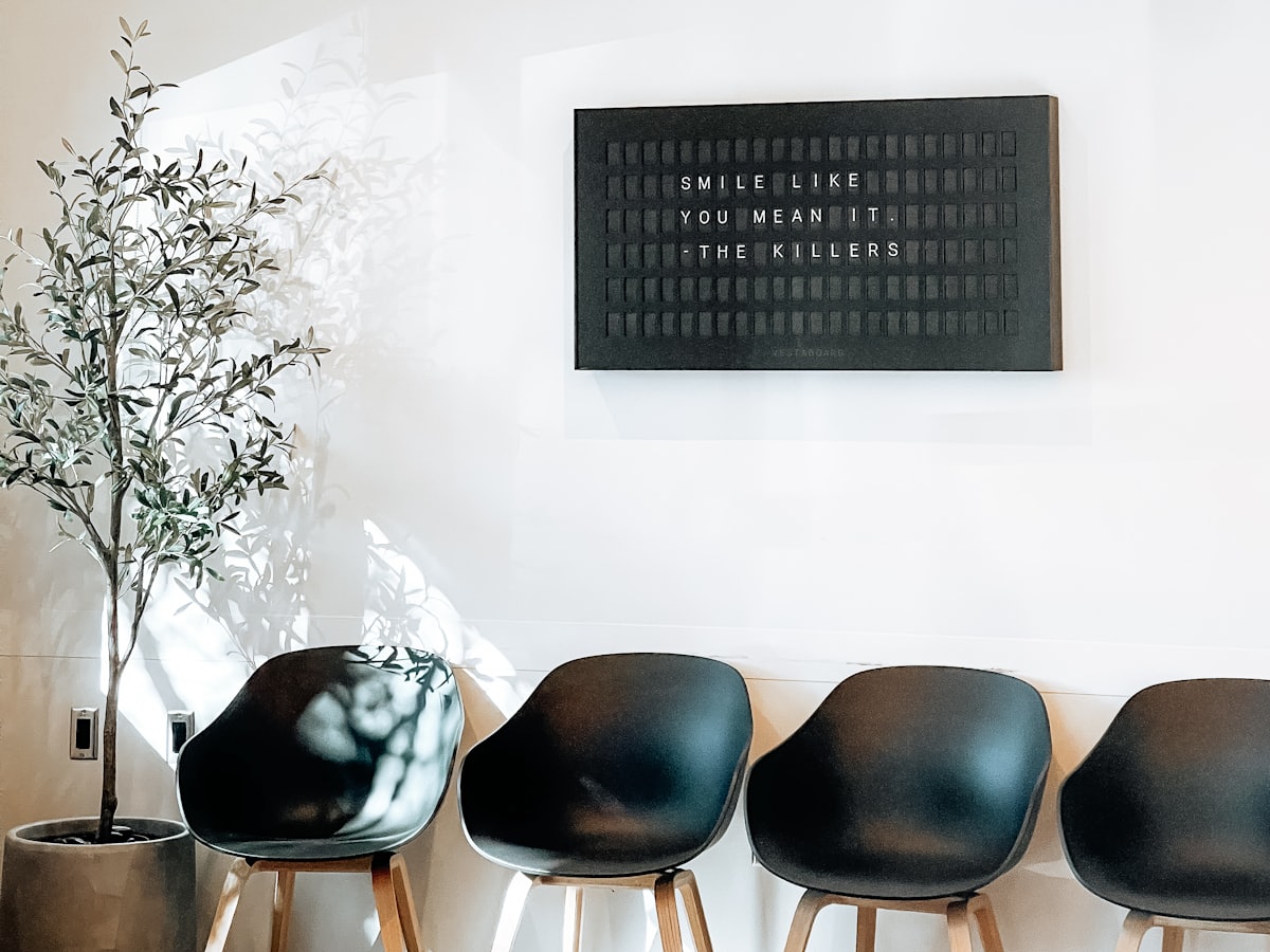 A waiting area with seating and natural light